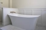 Large soaker tub on the main floor primary suite
